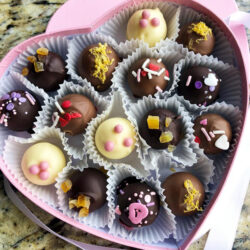 Assorted chocolate truffles in pink heart box